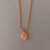 Collar de flor enmarcada