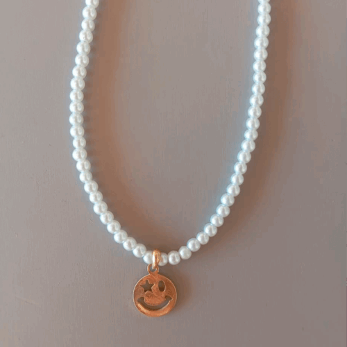 Capa 24 Collar de perlas