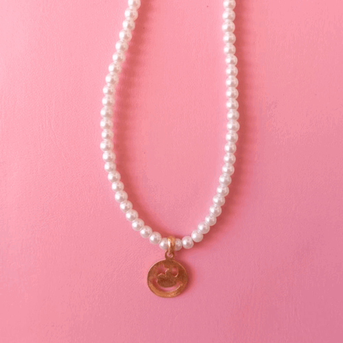 Capa 27 Collar de perlas