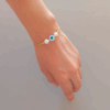 Pulsera verde con ojo turco