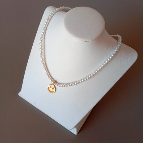 Capa 56 Collar de perlas